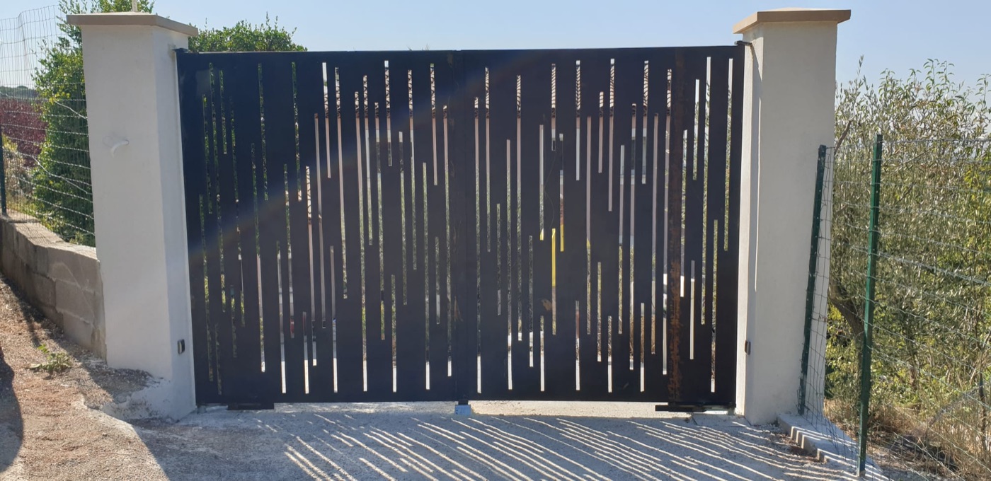 Portails en fer forgé — réalisation Atelier Gombertois